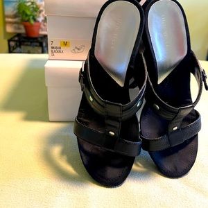 Nine West black leather and suede size 7 wedge heeled sandals, lightly worn.